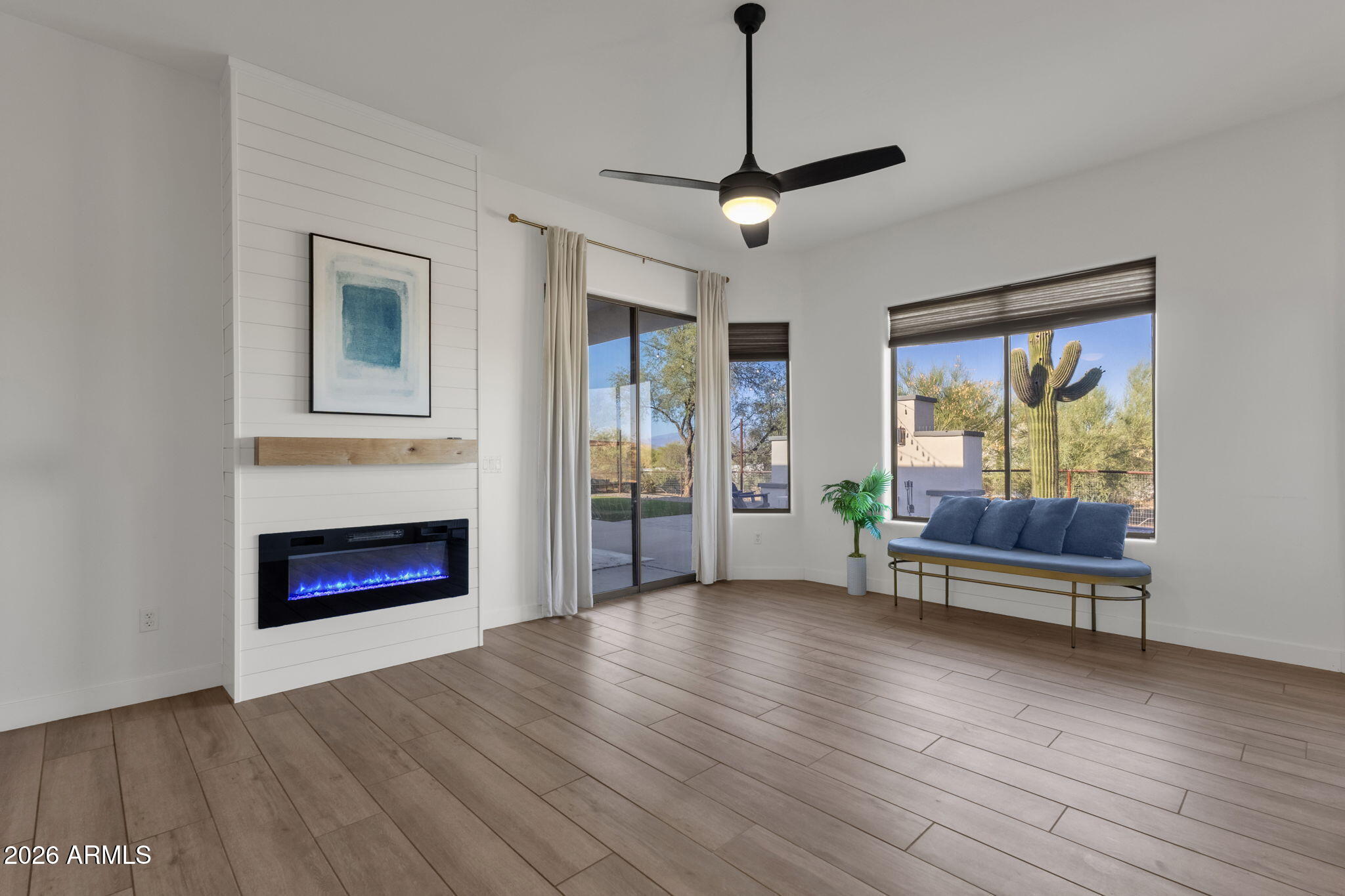 14604 East Peak View Road Scottsdale, AZ 85262 - Photo 21 of 55 a living room with furniture fireplace and window