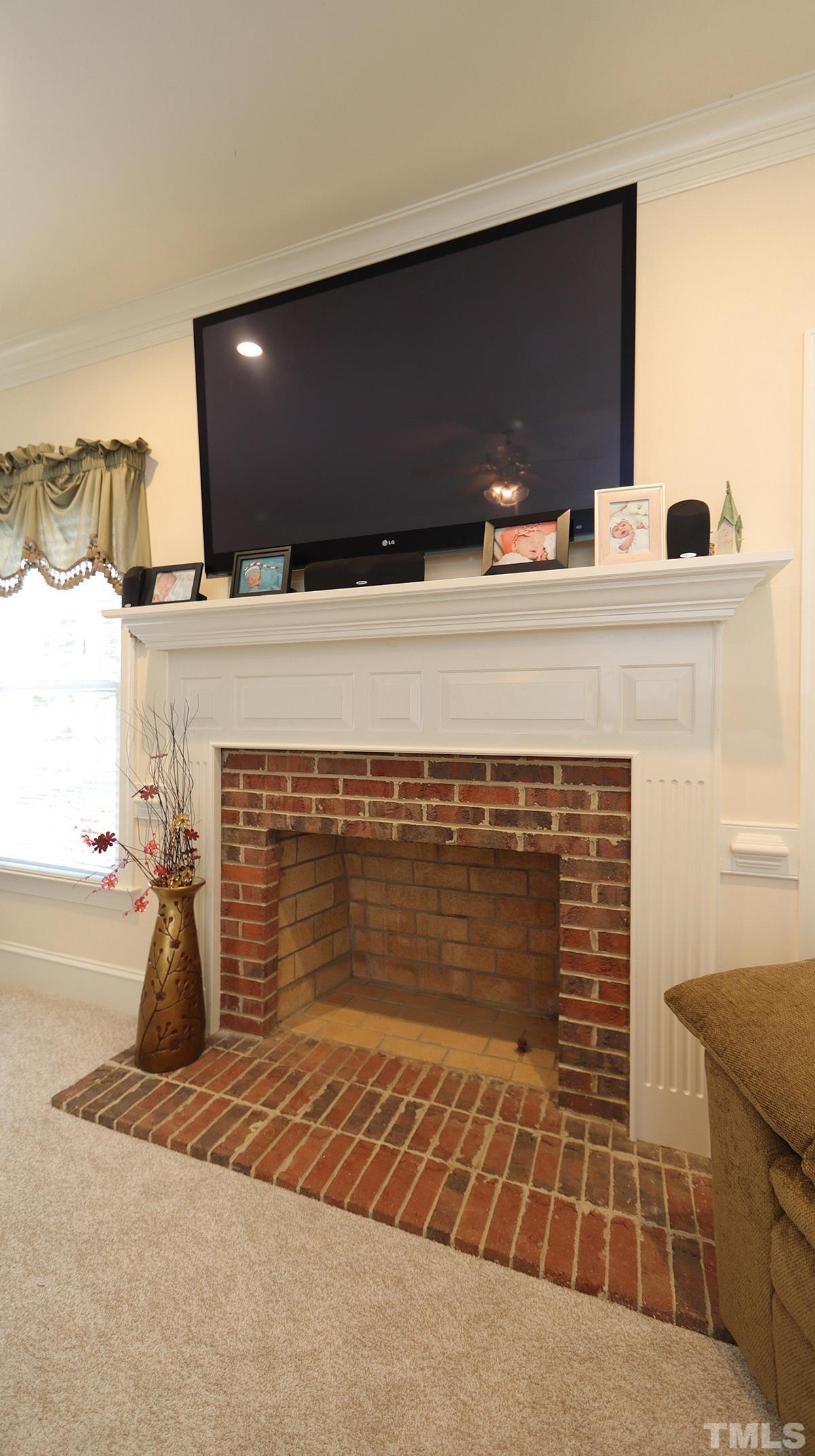409 Guy Walker Way Durham, NC 27703 - Photo 15 of 47 a bathroom with a sink and a mirror