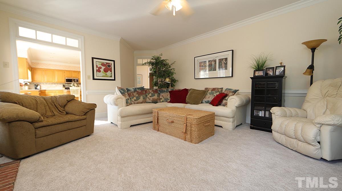 409 Guy Walker Way Durham, NC 27703 - Photo 16 of 47 a living room with furniture and a couch