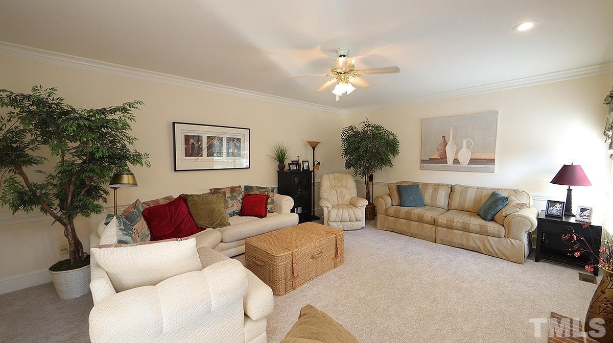 409 Guy Walker Way Durham, NC 27703 - Photo 17 of 47 a living room with furniture and a lamp