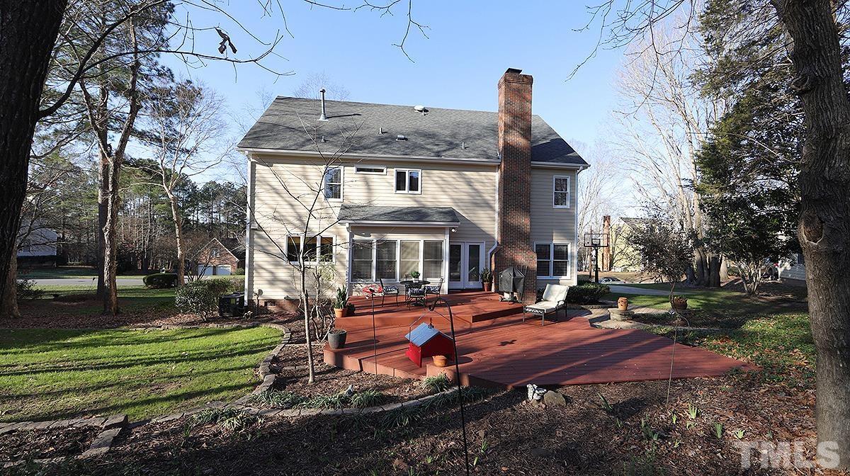 409 Guy Walker Way Durham, NC 27703 - Photo 38 of 47 a front view of a house with a garden