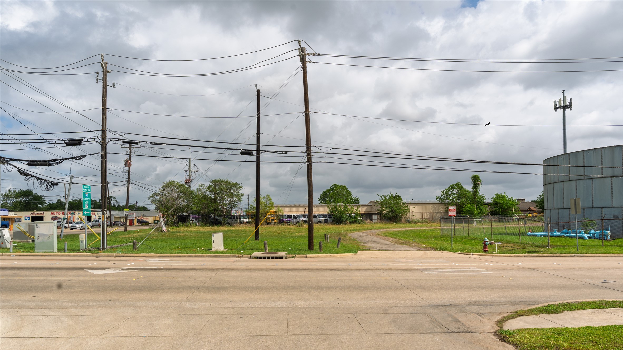 0 Shaver Street Pasadena, TX 77502 - Photo 6 of 6 a view of a big building next to a yard