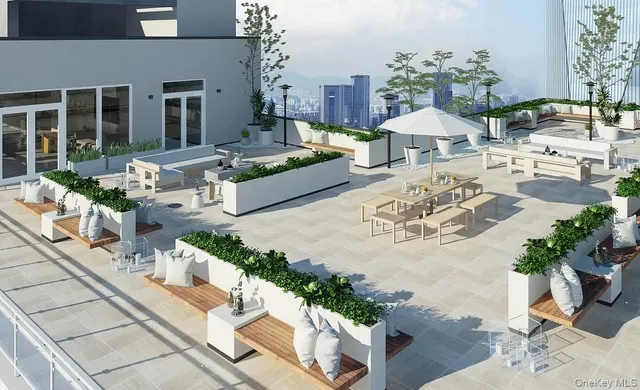 a view of a house with swimming pool and sitting area