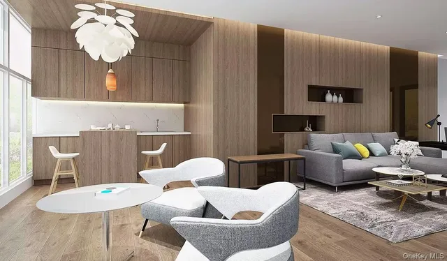 a living room with furniture and a lamp