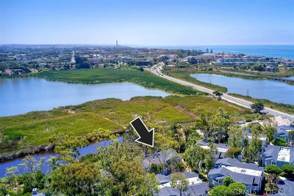 a view of a city with a lake