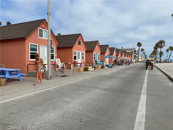 a view of a street with cars