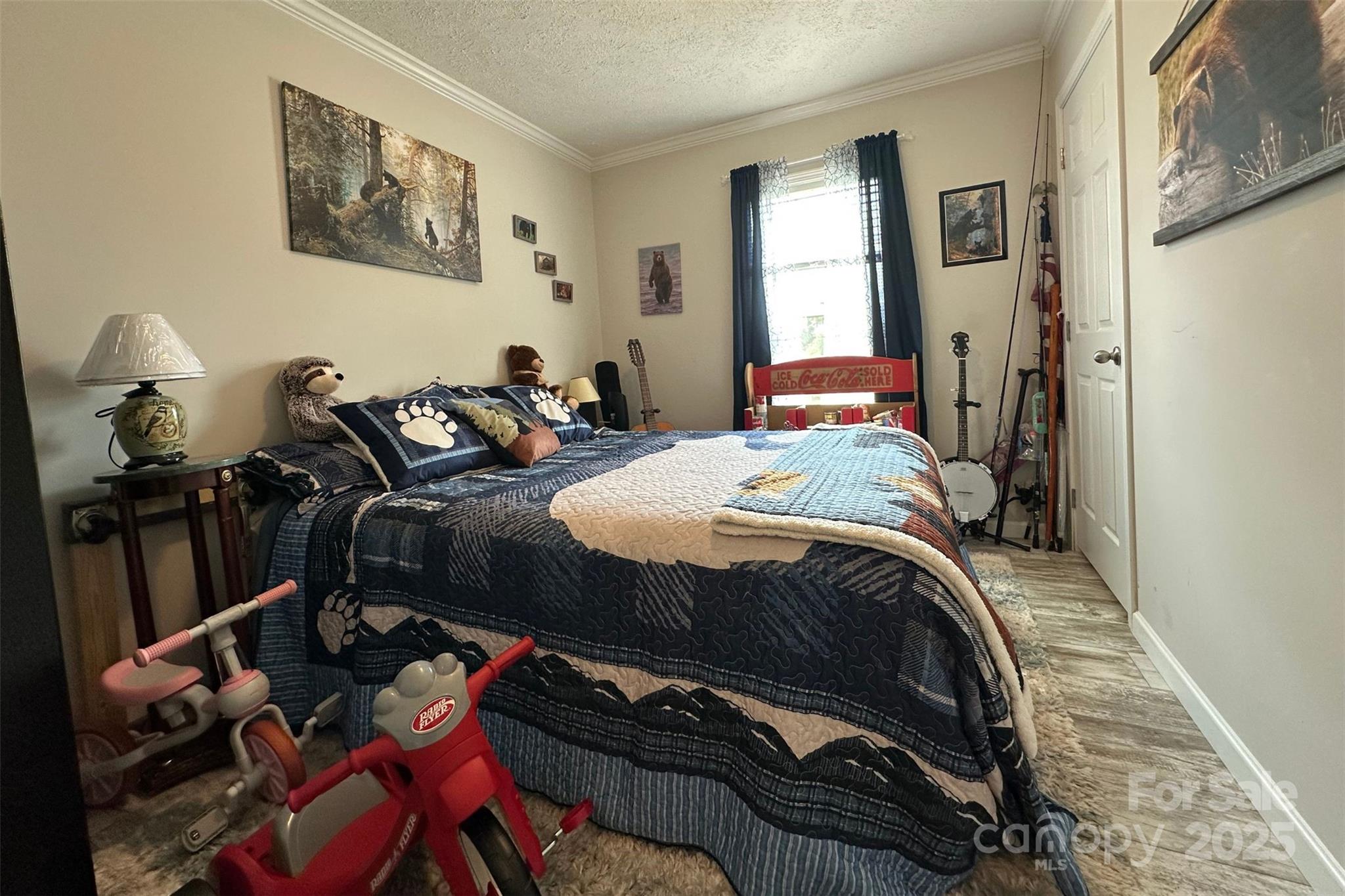 2449 Leonhart Road Cherryville, NC 28021 - Photo 11 of 21 a bedroom with bed and a window