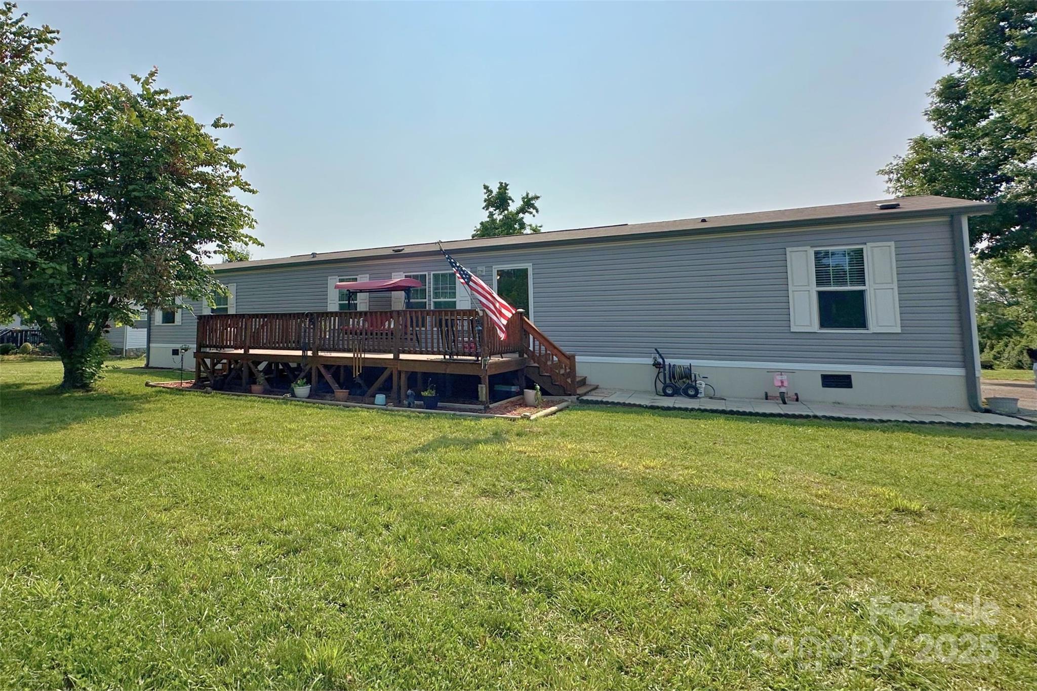 2449 Leonhart Road Cherryville, NC 28021 - Photo 2 of 21 a front view of a house with garden