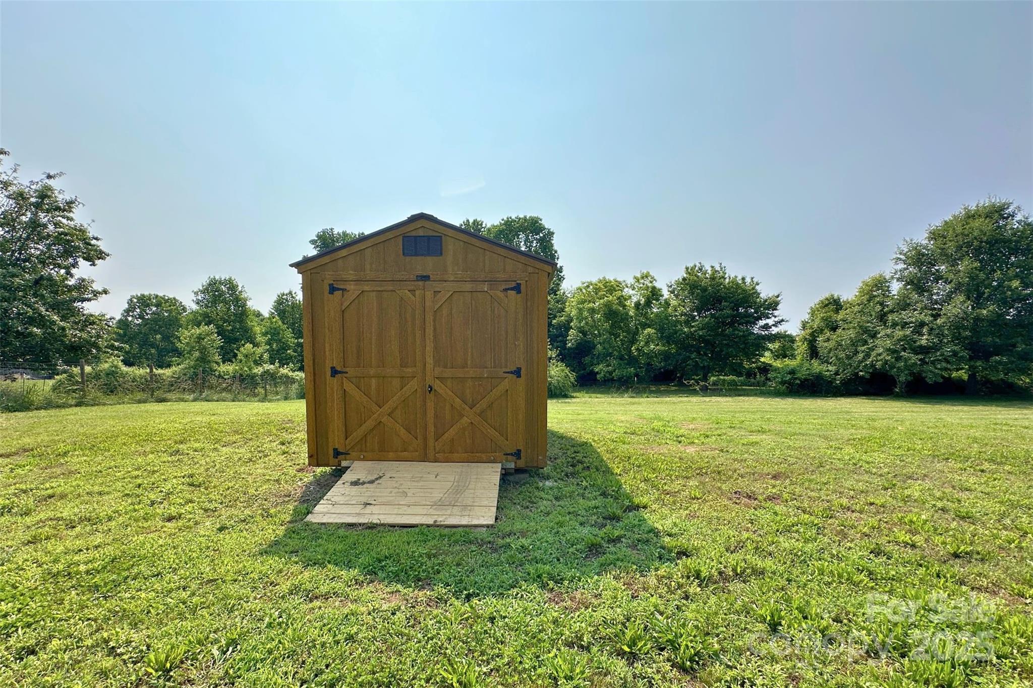 2449 Leonhart Road Cherryville, NC 28021 - Photo 21 of 21 a view of an outdoor space and a yard
