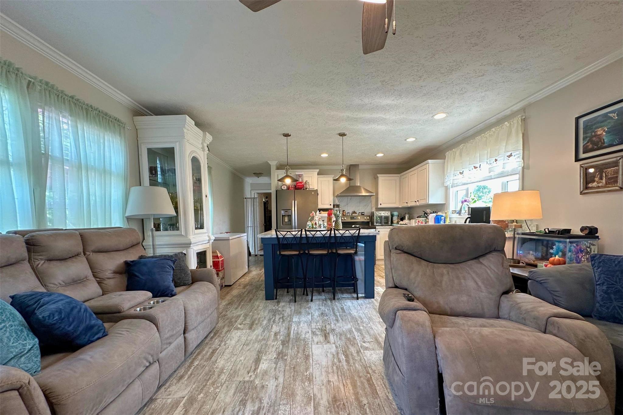 2449 Leonhart Road Cherryville, NC 28021 - Photo 5 of 21 a living room with furniture and a wooden floor