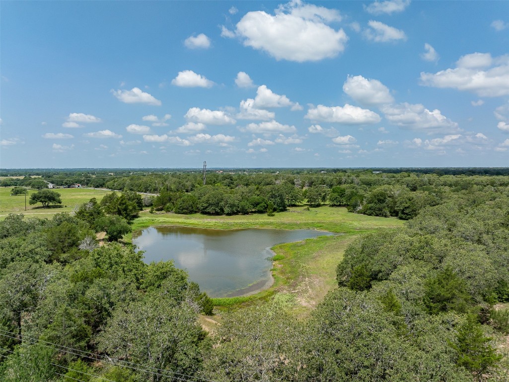 Tbd Halamicek Loop Fayetteville, TX 78940 - Photo 28 of 41 a view of a lake with a house in the background