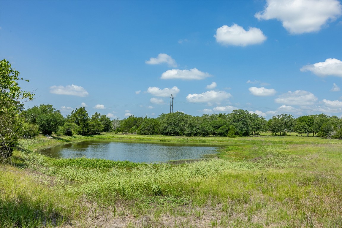 Tbd Halamicek Loop Fayetteville, TX 78940 - Photo 9 of 41 a view of a golf course with a lake