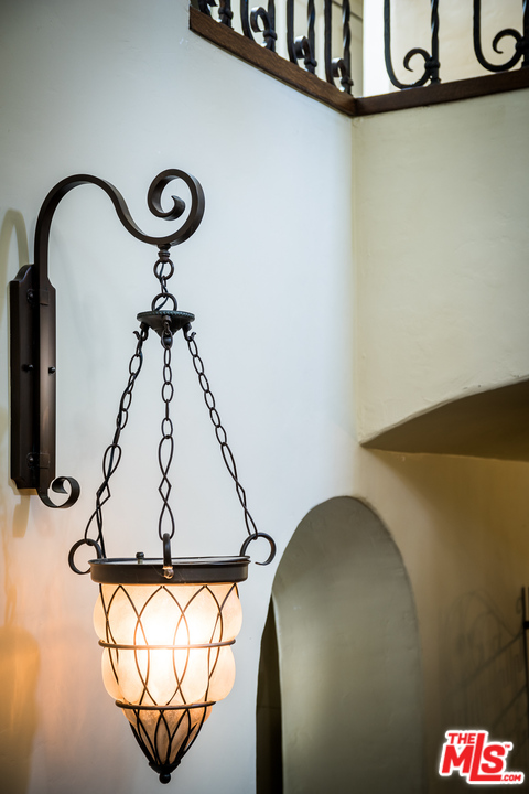 12730 Sunset Boulevard Los Angeles, CA 90049 - Photo 11 of 51 a picture of a bathroom with a sink and mirror