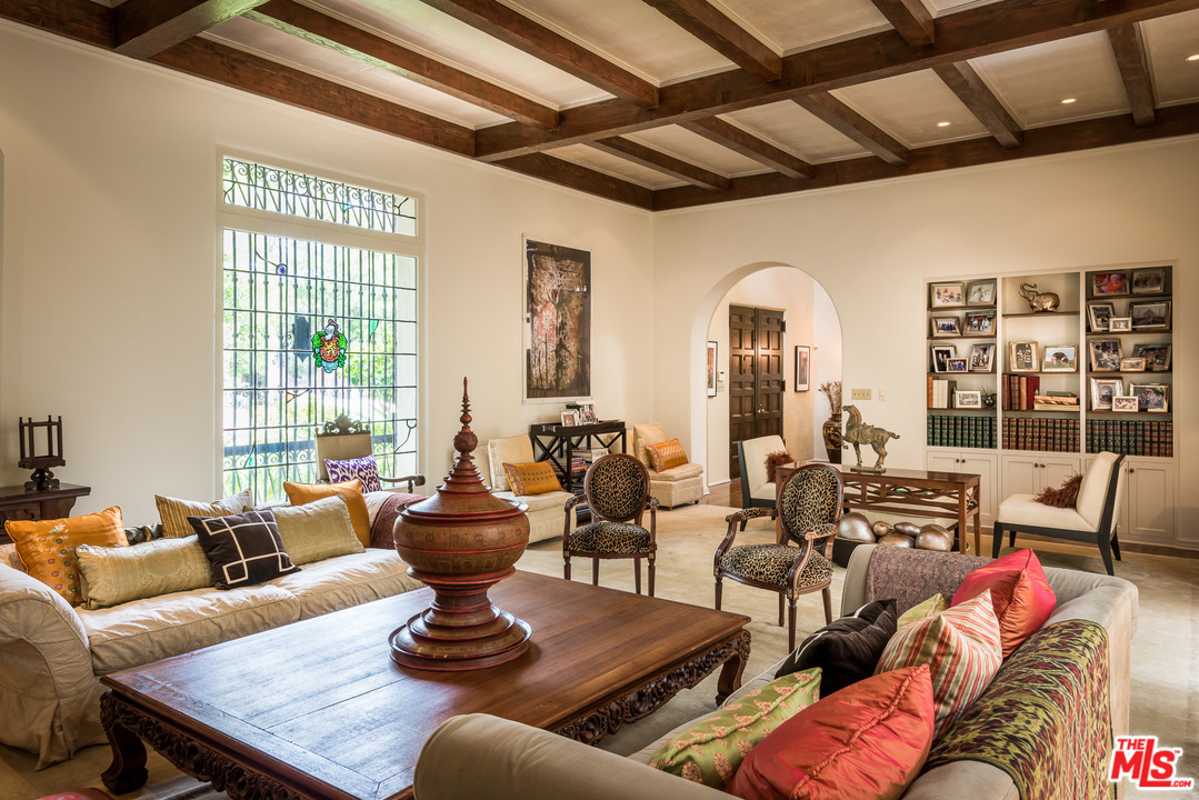 12730 Sunset Boulevard Los Angeles, CA 90049 - Photo 13 of 51 a living room with furniture or couch and a large window