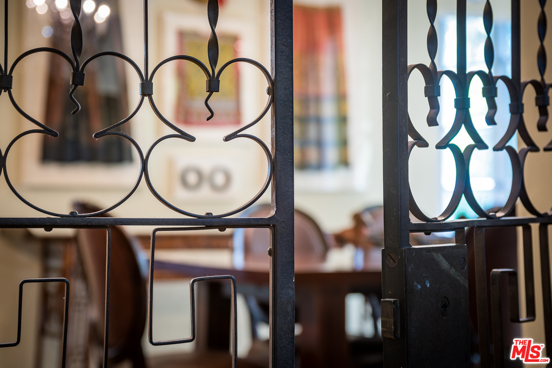 12730 Sunset Boulevard Los Angeles, CA 90049 - Photo 18 of 51 a close view of light fixtures and a mirror on a brick wall
