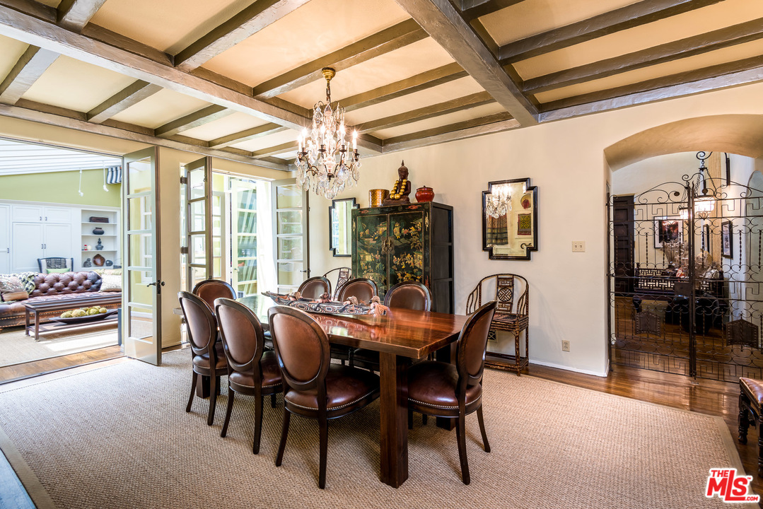 12730 Sunset Boulevard Los Angeles, CA 90049 - Photo 19 of 51 a view of a dining room with furniture