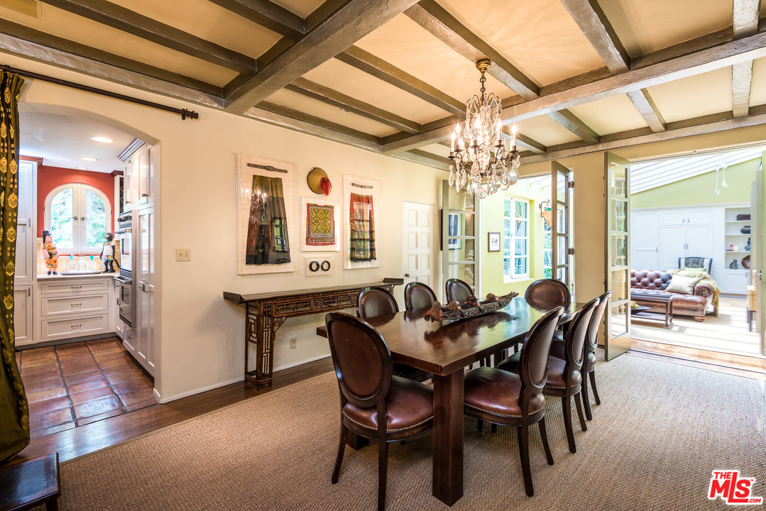 12730 Sunset Boulevard Los Angeles, CA 90049 - Photo 20 of 51 a view of a dining room with furniture and wooden floor