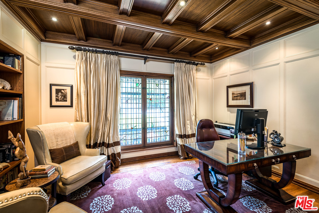 12730 Sunset Boulevard Los Angeles, CA 90049 - Photo 29 of 51 a living room with furniture and a window