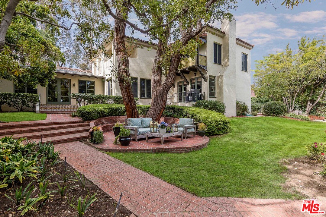 12730 Sunset Boulevard Los Angeles, CA 90049 - Photo 7 of 51 a view of a house with backyard and sitting area