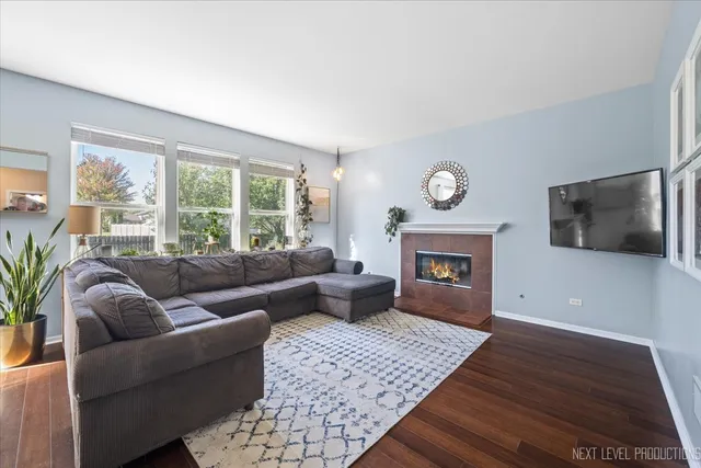 a bathroom with a toilet a sink and a mirror