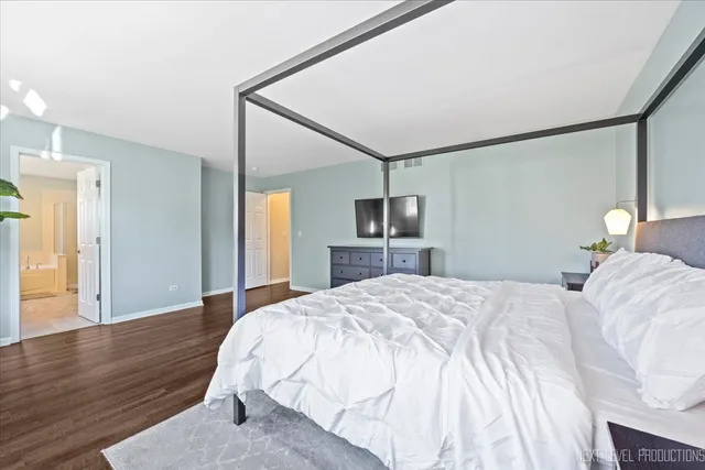 a room with furniture and wooden floor