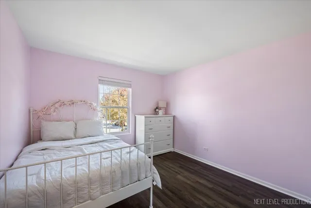 a view of backyard with swimming pool and outdoor seating
