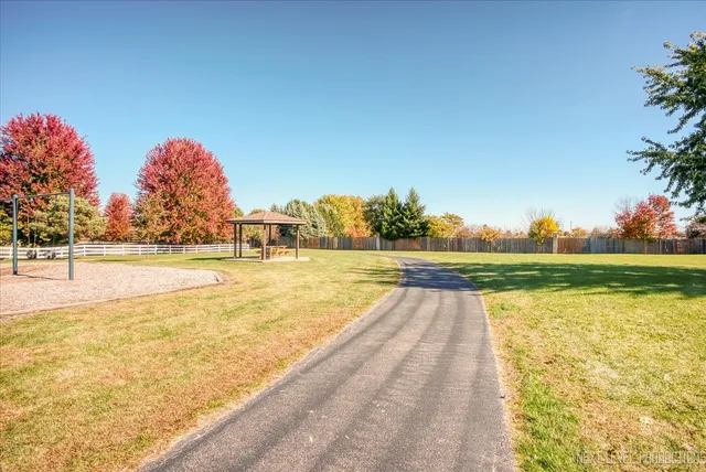 a view of a swimming pool with a patio