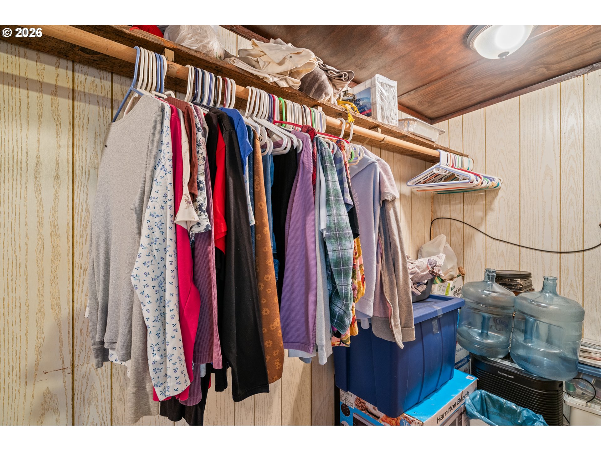 51982 Sunflower Flat Road Heppner, OR 97836 - Photo 18 of 44 a view of walk in closet with clothes and shoes