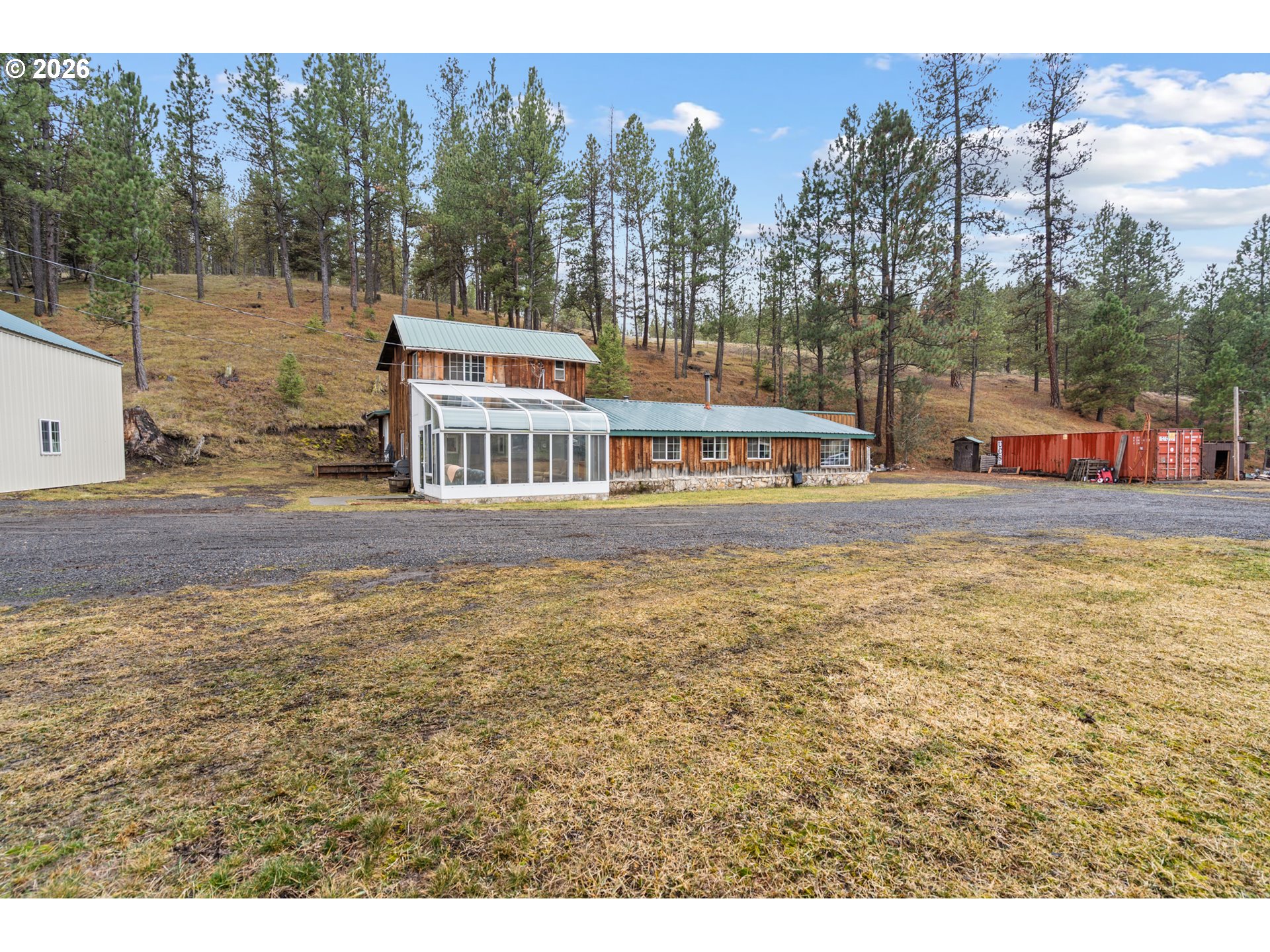 51982 Sunflower Flat Road Heppner, OR 97836 - Photo 3 of 44 a balcony with tall trees