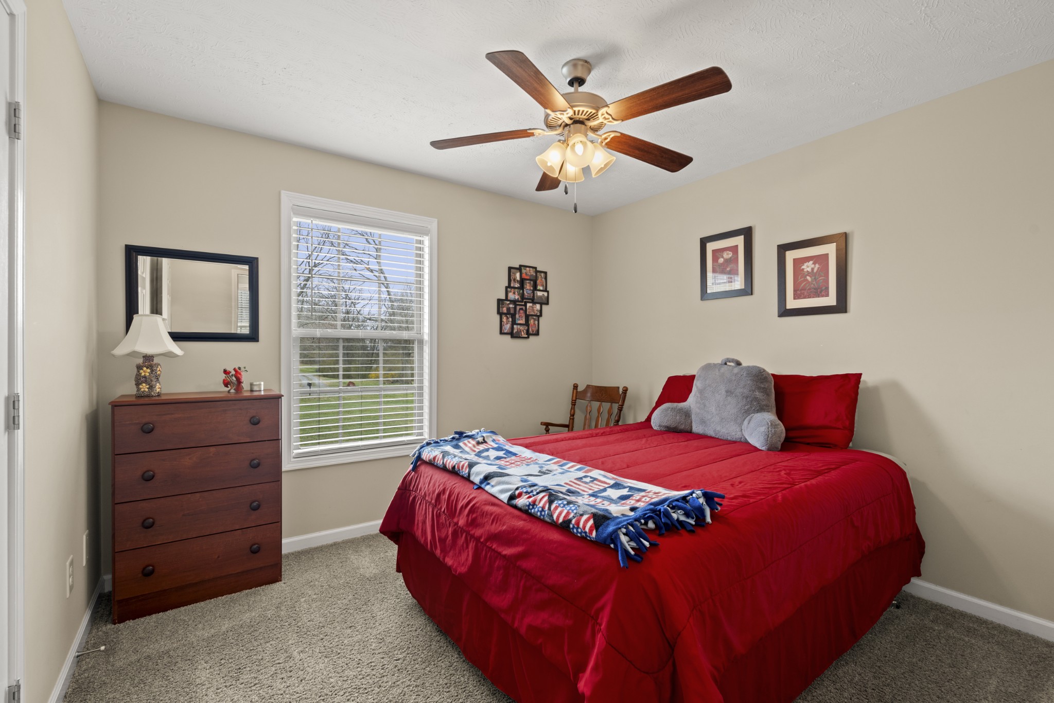 534 Martin Chapel Road Portland, TN 37148 - Photo 26 of 27 a bedroom with a large bed and a window