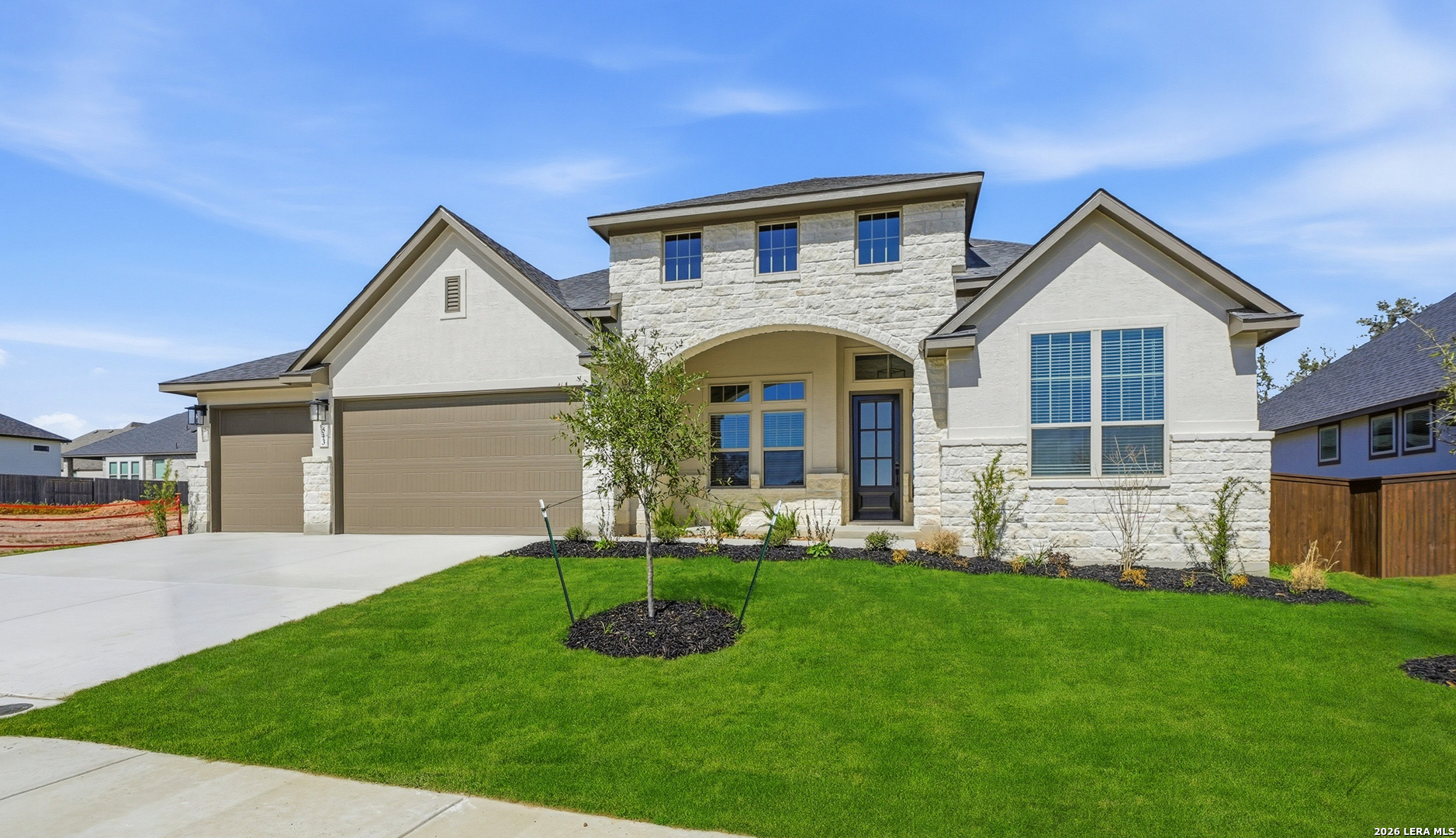 513 Corwin Springs Cibolo, TX 78108 - Photo 2 of 40 a front view of a house with a yard and garage