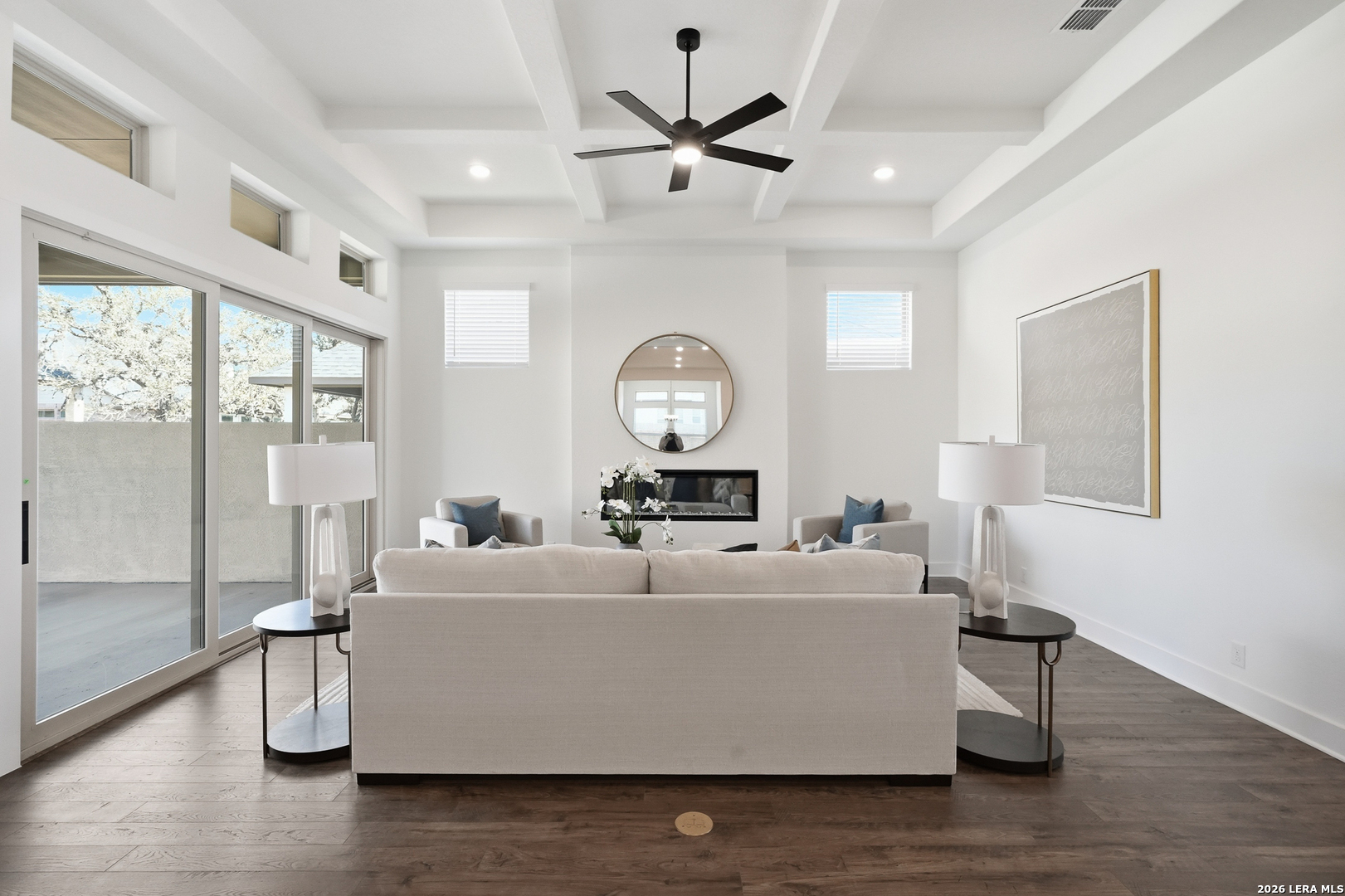 513 Corwin Springs Cibolo, TX 78108 - Photo 21 of 40 a living room with furniture and a large window with wooden floor
