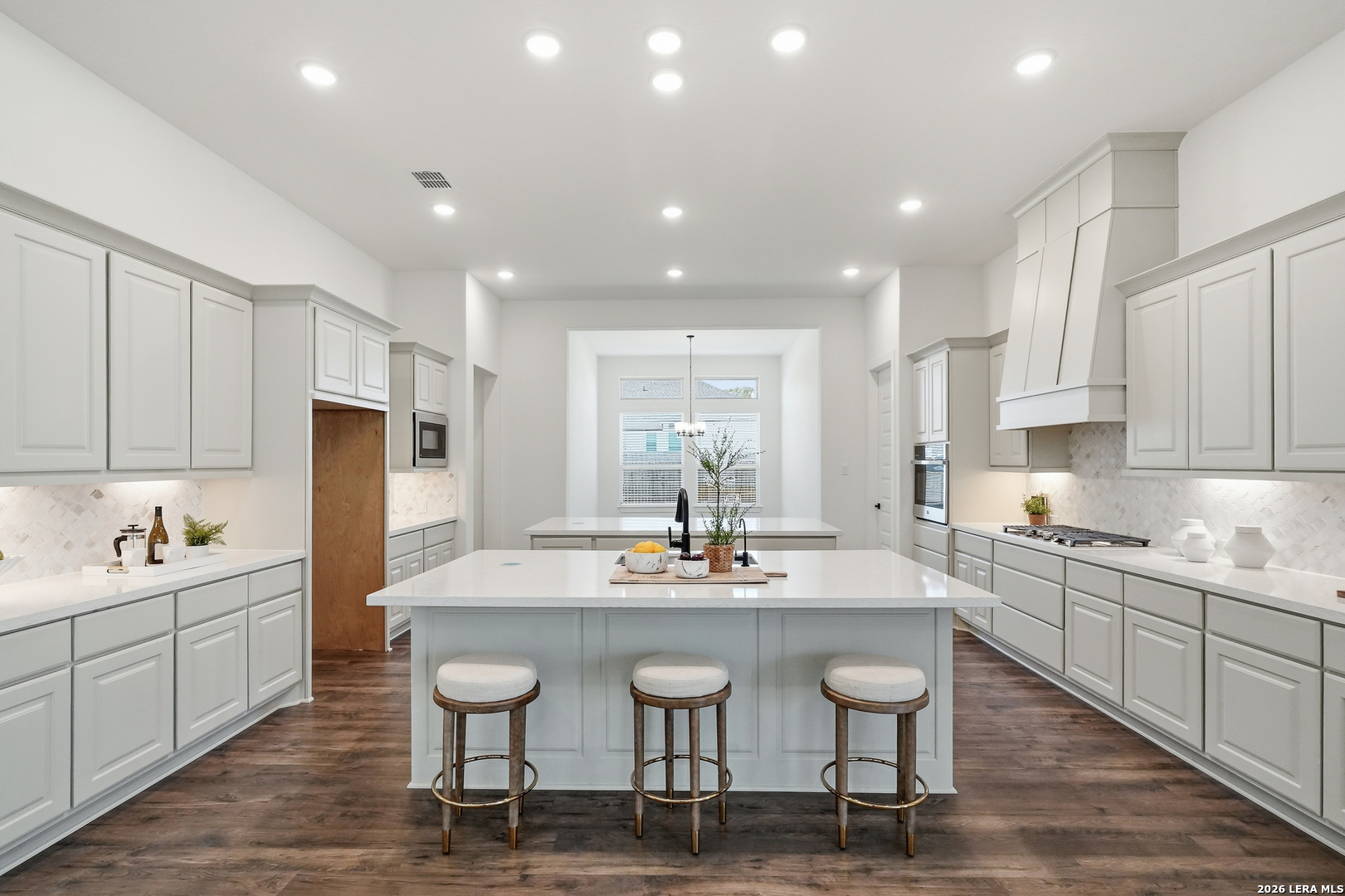 513 Corwin Springs Cibolo, TX 78108 - Photo 23 of 40 a kitchen with counter space a sink and appliances
