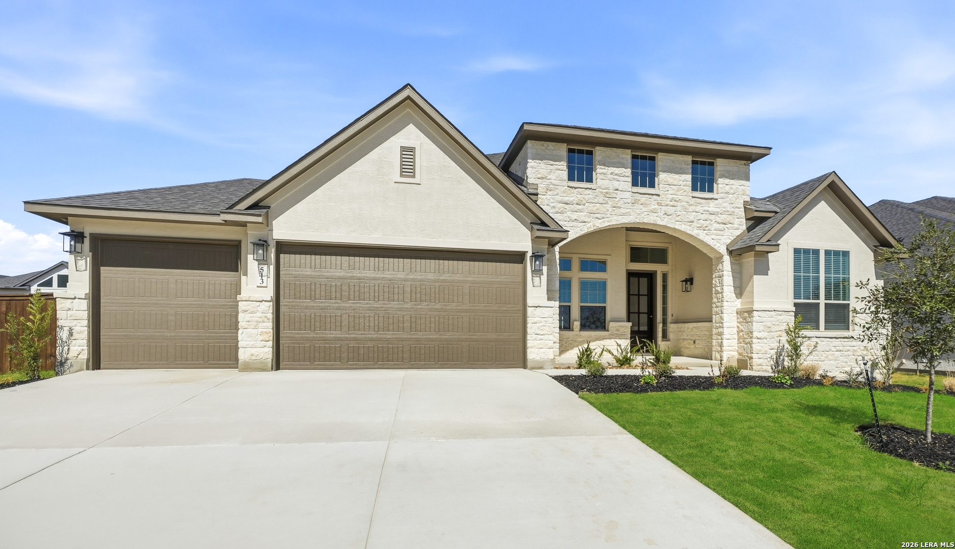 513 Corwin Springs Cibolo, TX 78108 - Photo 3 of 40 a front view of a house with a yard and garage