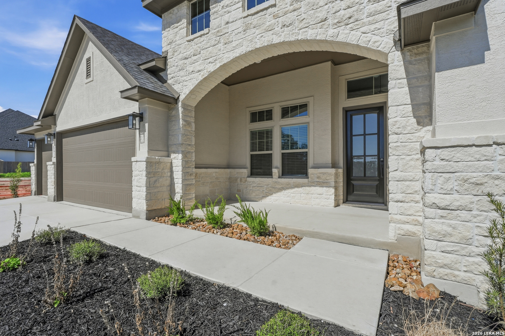 513 Corwin Springs Cibolo, TX 78108 - Photo 4 of 40 a front view of a house with potted plants