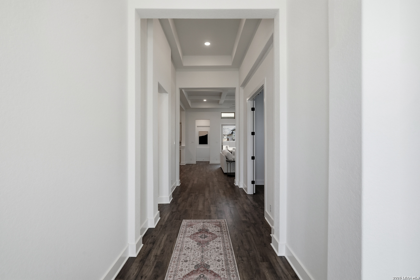 513 Corwin Springs Cibolo, TX 78108 - Photo 7 of 40 a view of hallway with wooden floor