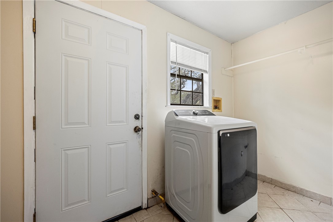 3087 Lenore Avenue Ingleside, TX 78362 - Photo 15 of 29 a utility room with dryer and washer