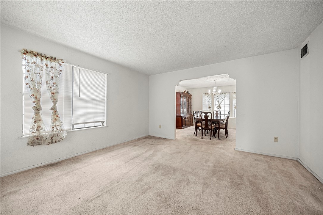 3087 Lenore Avenue Ingleside, TX 78362 - Photo 17 of 29 a view of workspace with furniture and a window