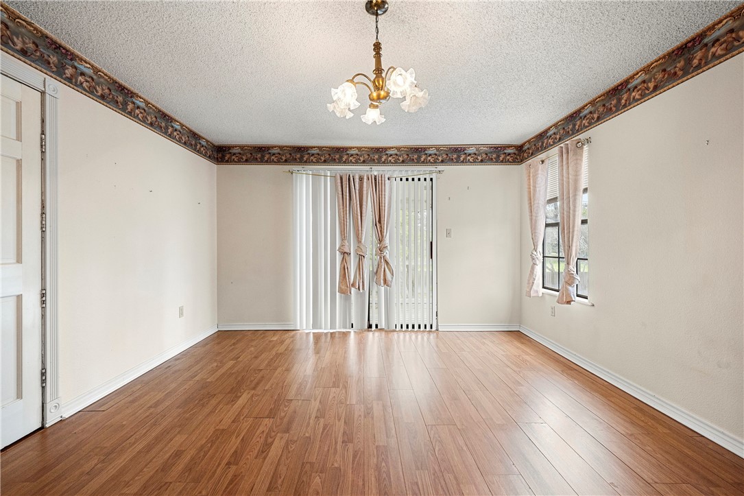 3087 Lenore Avenue Ingleside, TX 78362 - Photo 22 of 29 a view of entryway with wooden floor