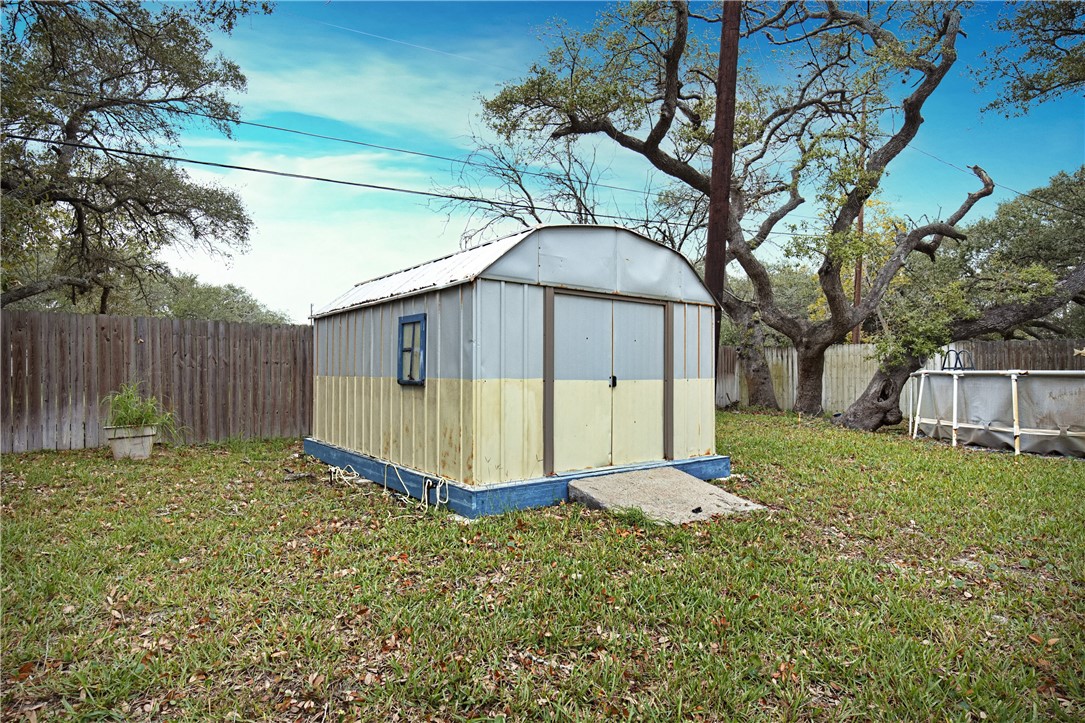 3087 Lenore Avenue Ingleside, TX 78362 - Photo 27 of 29 a view of a backyard with a garden and entertaining space