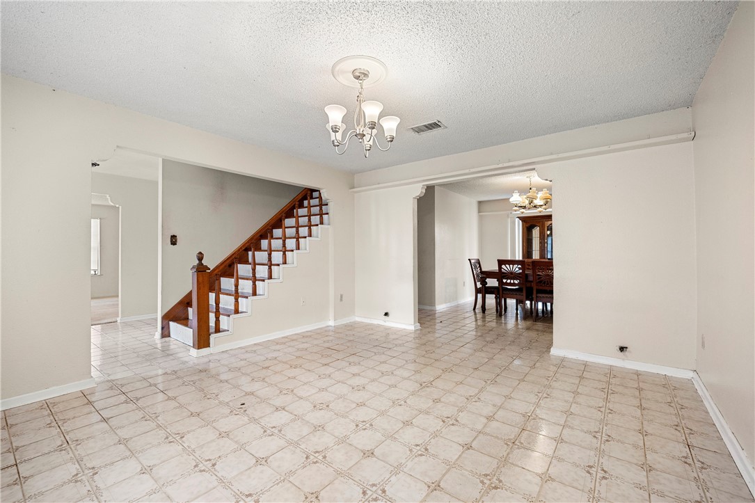 3087 Lenore Avenue Ingleside, TX 78362 - Photo 9 of 29 a view of entryway and hall with dining room