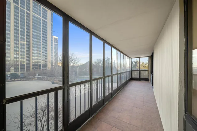 a view of a large room with wooden floor