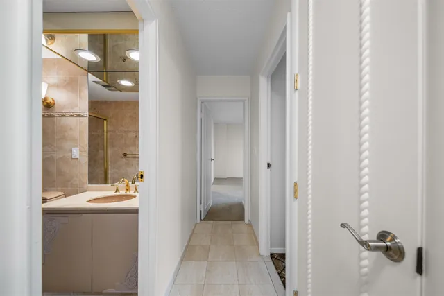 a bathroom with a sink and mirror