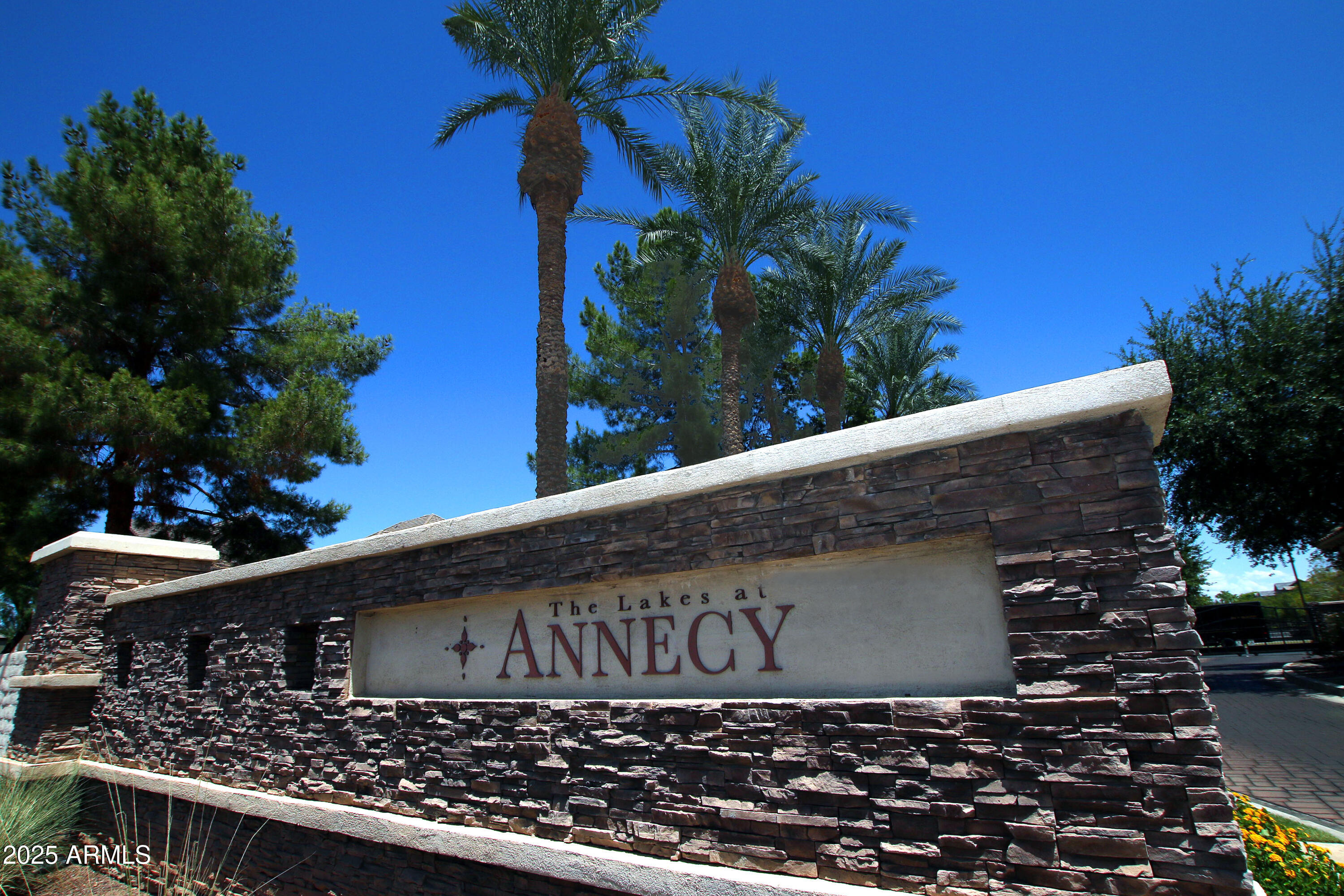 2785 South Alpine Drive Gilbert, AZ 85295 - Photo 1 of 31 a black and white photo of a street