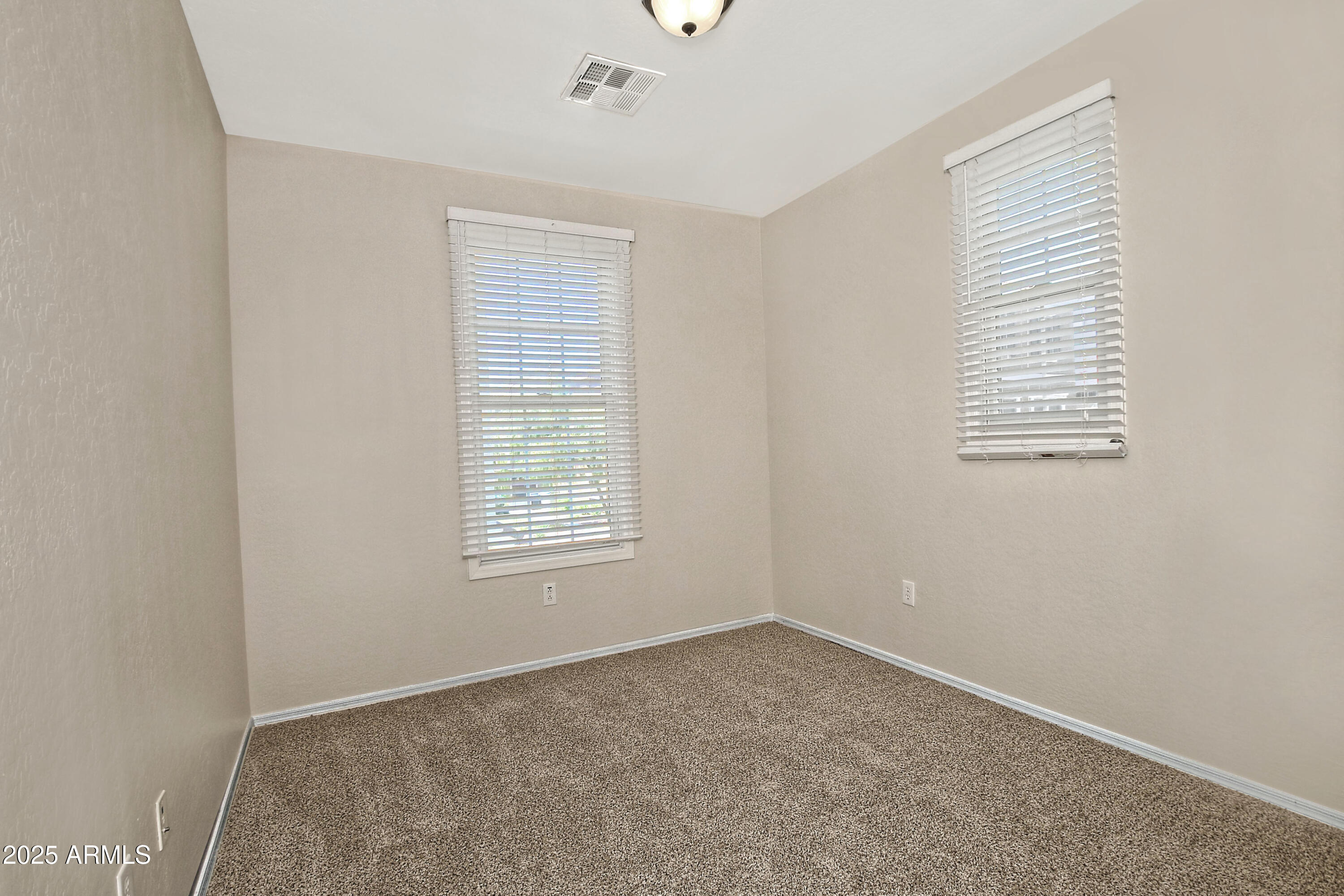 2785 South Alpine Drive Gilbert, AZ 85295 - Photo 15 of 31 an empty room with a window
