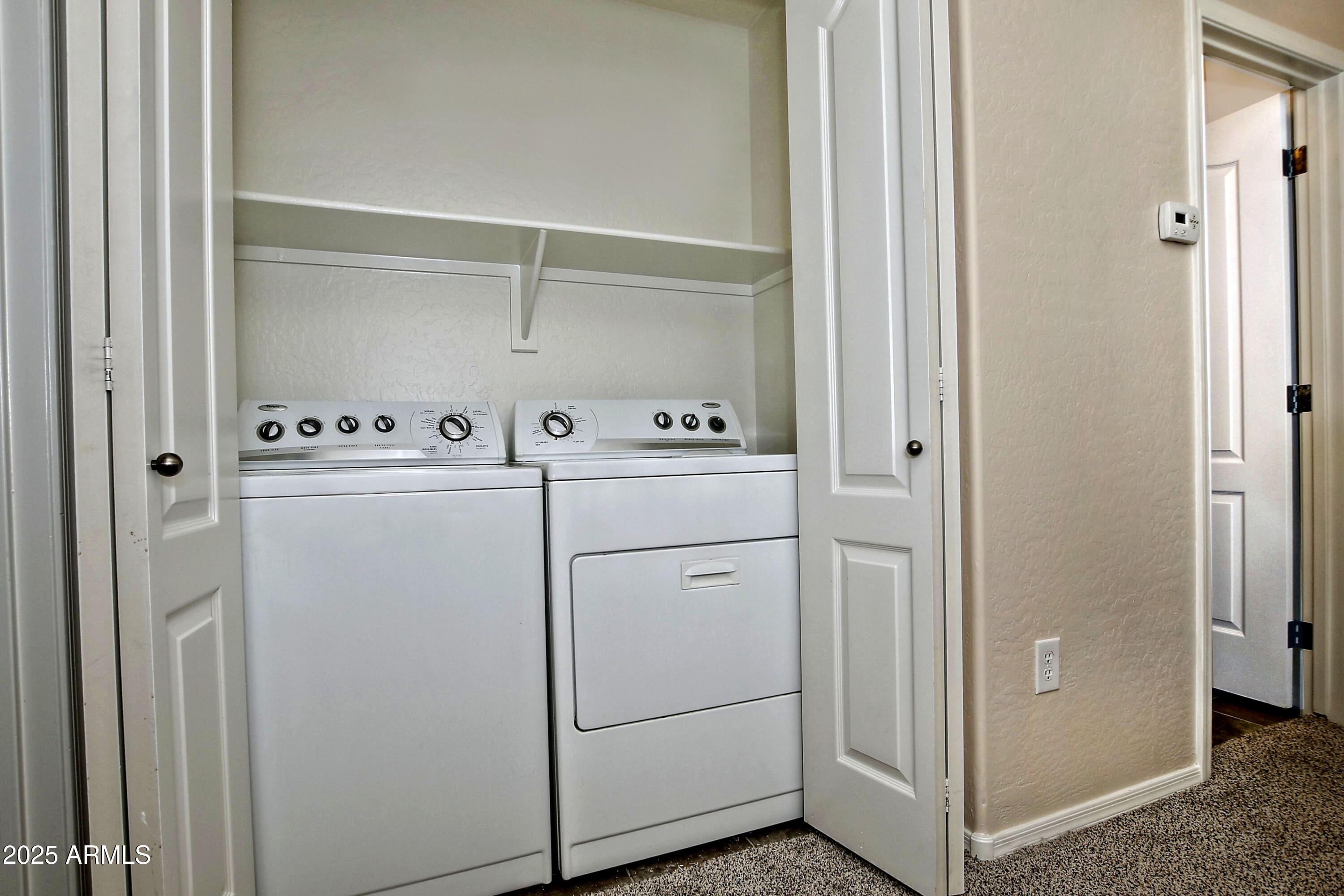 2785 South Alpine Drive Gilbert, AZ 85295 - Photo 27 of 31 a utility room with dryer and washer