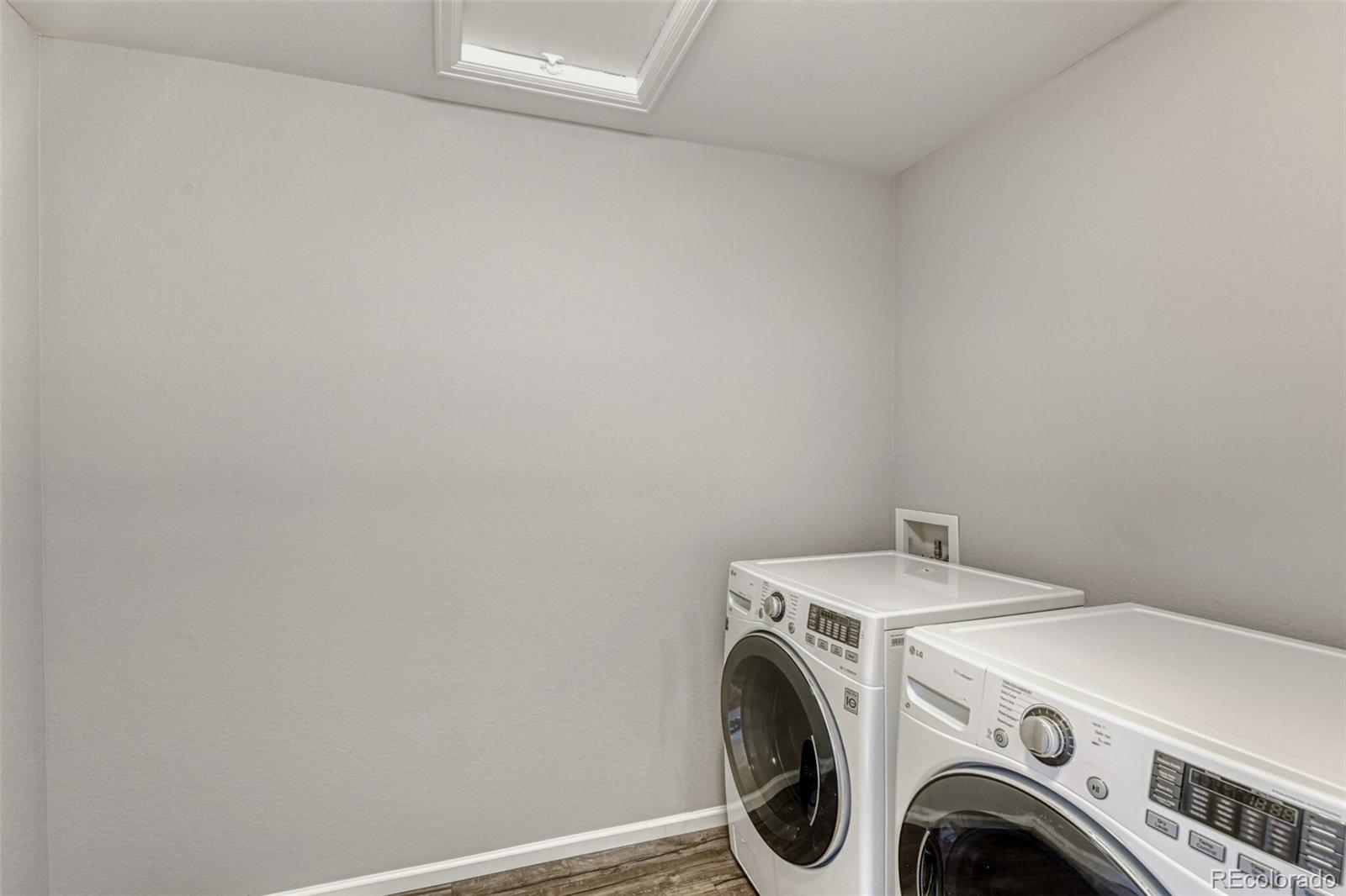 2725 East 159th Way Thornton, CO 80602 - Photo 28 of 36 a utility room with dryer and washer