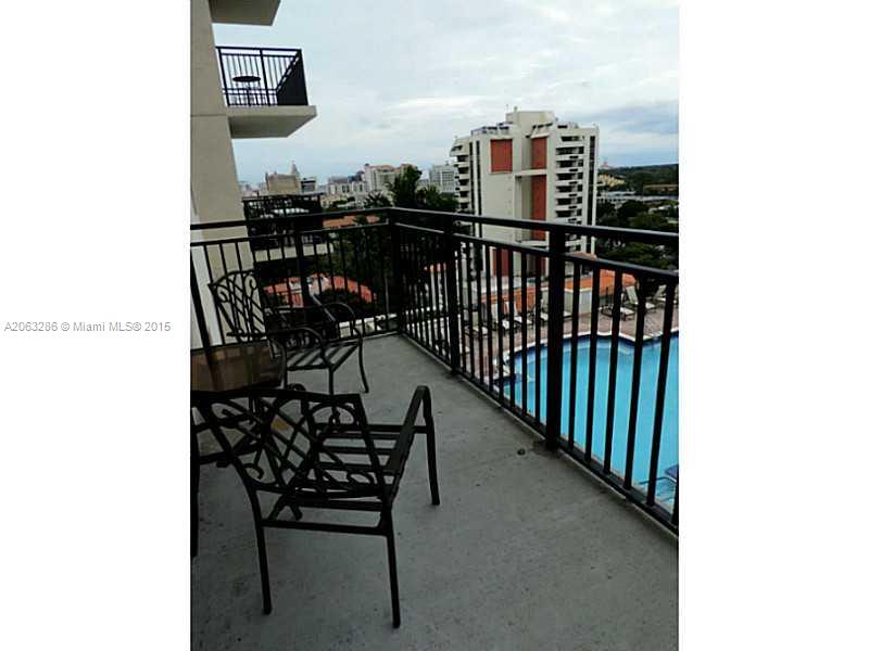 888 Douglas Road, Unit 1016 Coral Gables, FL 33134 - Photo 14 of 34 a view of a balcony with chairs