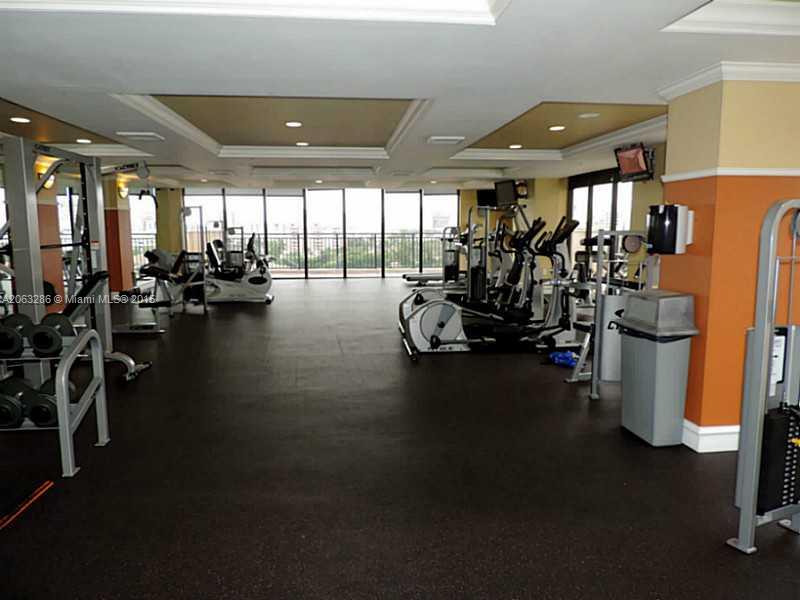 888 Douglas Road, Unit 1016 Coral Gables, FL 33134 - Photo 22 of 34 a view of a room with gym equipment
