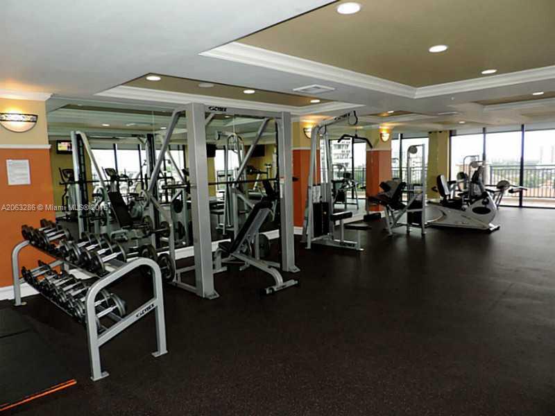 888 Douglas Road, Unit 1016 Coral Gables, FL 33134 - Photo 23 of 34 a view of a room with gym equipment